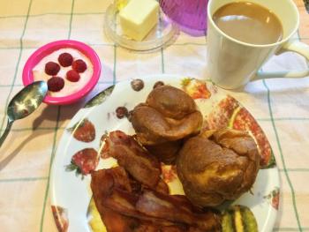 Popovers, bacon, yogurt with fruit and coffee. A delicious 1/5 healthy, 4/5 decadent breakfast. SUZI THAYER/Boothbay Register