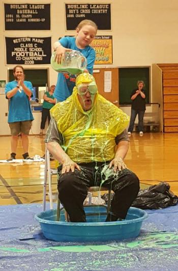 BRES student Susannah Edwards was the top fundraiser for the annual Jump Rope for Heart campaign and had the honor of sliming BRES Principal Mark Tess, ever the good sport. STEVE EDWARDS/Boothbay Register
