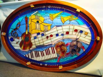 Local stained glass artisan Richard Macdonald’s new window for the Opera House at Boothbay Harbor. SUZI THAYER/Boothbay Register