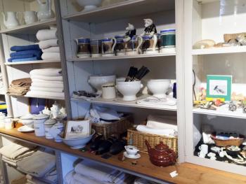 French and English dinnerware and antique French linens at the Marston House in Wiscasset. SUZI THAYER/Boothbay Register