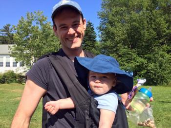 James and baby Abe Renfro attend the Family Fun Day and Summer Carnival on Southport on July 13. SUZI THAYER/Boothbay Register