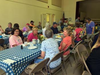 Lots of people turn out for lunch at the Southport Country Fair and Lobster Roll Luncheon on July 20. SUZI THAYER/Boothbay Register