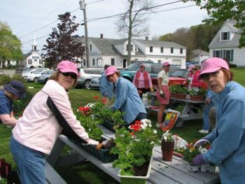 Boothbay Region Garden Club members prepare window boxes for display at the local town and post offices. Courtesy photo