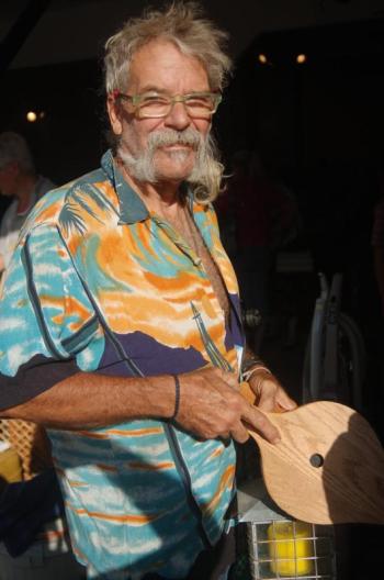 Local artist Mike Lewis collects a pile of flea market items. ART MAYERS/Boothbay Register