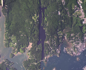 West Harbor Pond from GoogleEarth imagery. Route 27 (at the bottom of image) travels over the earthen dam that separates the pond from the sea.