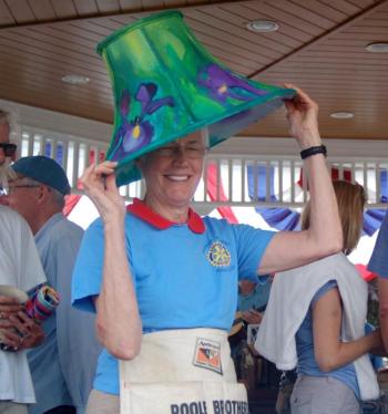Rotary volunteer Penny Pollard demonstrates an alternate use for a lampshade. ART MAYERS/Boothbay Register
