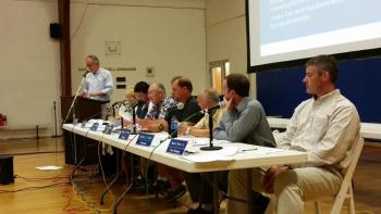 Stephen S. Sawyer Jr., left, vice president of transportation services at Sebago, addresses the crowd. Beginning second from left are secretary Sherry Tibbetts, Selectman Chuck Cunningham, Vice Chairman Douglas Burnham, Chairman Dale Harmon, Selectman Stephen Ham, Selectman Steven Lewis, and Town Manager Daniel Bryer Jr. KATRINA RICKERMANN/Boothbay Register