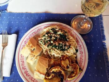 Linguine (with ricotta and lemon) with clam sauce, roasted summer squash from Sue Mello’s garden, and crusty bread. And chardonnay. SUZI THAYER/Boothbay Register