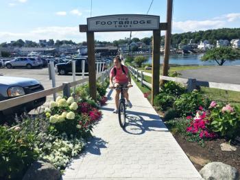 Before the footbridge sign was hung on the east side of the footbridge, no one ever stopped there. Now people are stopping, taking pictures, and taking notice of the upgrades. SUZI THAYER/Boothbay Register
