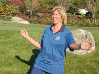 Brenda Blackman cheers on golfers. ART MAYERS/Boothbay Register