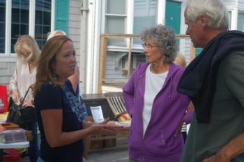 Lori Reynolds guides visitors to Harbor Fest 2016. ART MAYERS/Boothbay Register