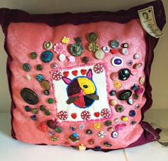 An embroidered pillow by Barbara Welborn. Courtesy of Kimberly Welborn