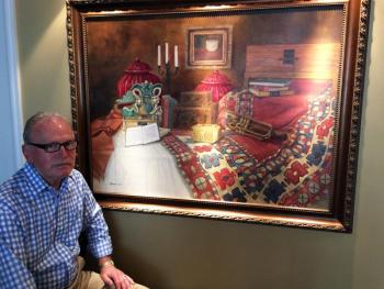 Thomas Cramer with one of his large still life paintings. SUZI THAYER/Boothbay Register