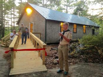 Draco Peaslee talks about his Eagle Scout project – building a new set of steps and ramp – at the Boothbay Region Fish & Game Club in Boothbay. A ribbon-cutting ceremony for the project was held Sept. 21. Courtesy of Sarah Sherman