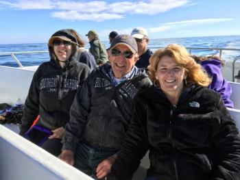 Janet Devalder Thornton, left, her sister, Linda Mazzochetti, and their father Raymond Vogt, from Rochester, New York, hope to see a whale. SUZI THAYER/Boothbay Register