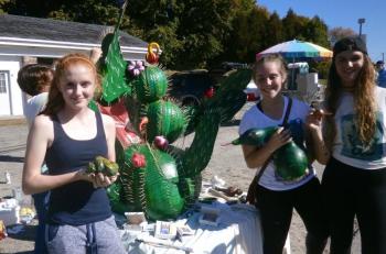 Lincoln Academy students Kate Peters, Anna Sirois, and Carly Ransdell, members of the National Art Society, create a desert scene. ART MAYERS/Boothbay Register