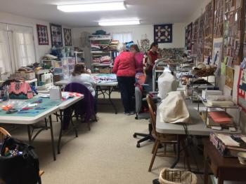 The room in Karen Keyes’ basement where the Kwilts 4 Kidz women work their quilting magic. SUZI THAYER/Boothbay Register