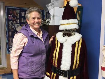 Mattie Welch with the Santa costume she made. SUZI THAYER/Boothbay Register