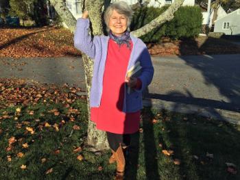 “Red Ruby Heart in a Cold Blue Sea” author Morgan Callan Rogers, in front of the Boothbay Register, where she works as a reporter. SUZI THAYER/Boothbay Register