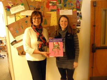 Principal Lisa Clark, left, and Cindy Casey, 1st and 2nd grade teacher, both of Edgecomb Eddy School with “The Frightened Frog.” Courtesy photo