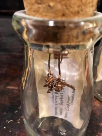 Copper honeybee earrings by Alyce Paul Curiosities. SUZI THAYER/Boothbay Register