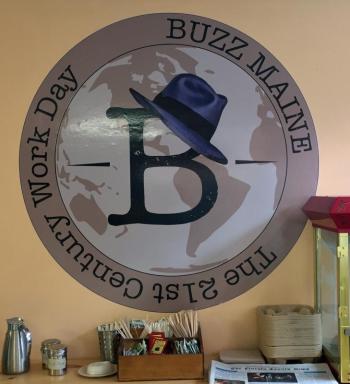 BUZZ MAINE’s logo on a wall in the coffee shop at the new business in Damariscotta. SUZI THAYER/Boothbay Register