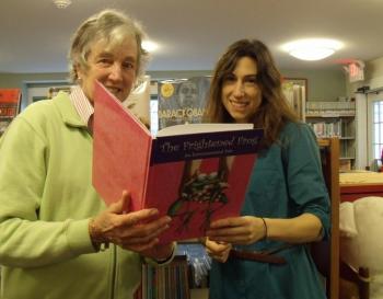 Mimi O'Neill, left, BRGC president and Desiree Scorcia, Boothbay Harbor Memorial Library youth services librarian, discussing “The Frightened Frog.” Courtesy photo