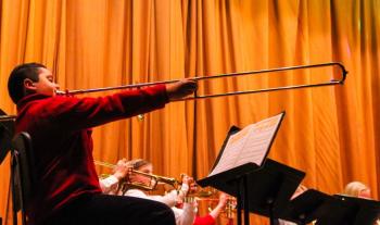 A fourth grade band student chooses the trombone to reach for the stars. DIANE DORBIN/Boothbay Register Holiday Band Concert BRES/BRHS