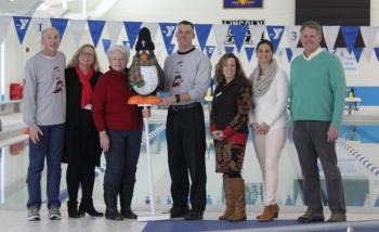 Chief Bob Hasch, this year’s Penguin Plunge honoree, is surrounded by other community advocates at the Boothbay Region YMCA pool on Thursday, Dec. 8. From left, Larry Brown, Holly Stover, Sue Burge, the Penguin, Bob Hasch, Karen-Ann Hagar, Anni Pat McKenney, and Andy Hamblett. SUE MELLO/Boothbay Register
