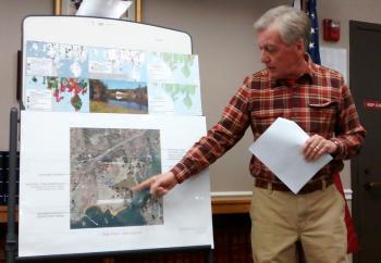 Boothbay Region Land Trust Board of Directors Vice President Hal Moorefield details some of the features of the Oak Point property to a captive audience. MORGAN CALLAN ROGERS/Boothbay Register