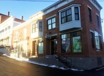 8 Wharf Street in Boothbay Harbor was designed to Rahul Anand’s specifications to resemble other architecture in town. SUZI THAYER/Boothbay Register