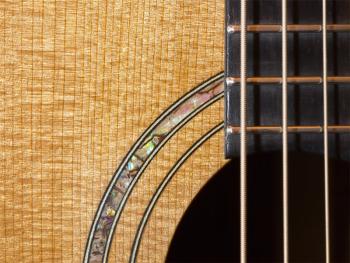 Big Wave Guitars’ torrefied Adirondack red spruce top with abalone inlay. Courtesy of Mike Gerstner Big Wave Guitars