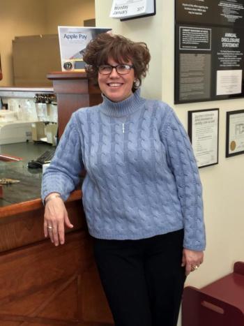 Angie McLellan, pictured here at her workplace, Bath Savings in Boothbay Harbor, lost 12.4 pounds during the three-month challenge. SUZI THAYER/Boothbay Register
