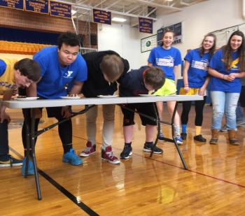 Jacob Wilson comes up for air during the teeny little pie-eating contest. MORGAN CALLAN ROGERS/Boothbay Register