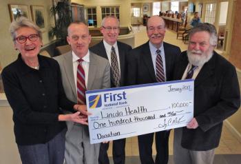 Holding a mock donation check are, from left, LincolnHealth Board Member Marva Nesbit, First National Bank CEO Tony McKim, First National Bank Executive Vice President and Treasurer Rick Elder, LincolnHealth President and CEO Jim Donovan and LincolnHealth Chief Medical Officer Russ Mack. Courtesy of Scott Shott/LincolnHealth