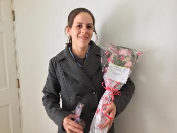 Jessica Kane delivers roses to a lucky valentine at the Boothbay Register. SUZI THAYER/Boothbay Register