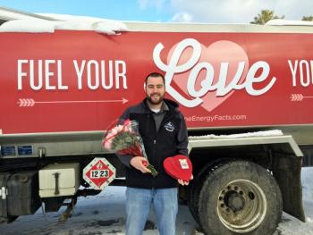 Matt Poole, manager of Colby & Gale Inc., gets ready to deliver roses, chocolates and a free oil tank fill-up to customers on Valentine’s Day. SUZI THAYER/Boothbay Register