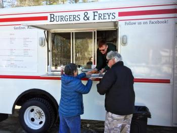 A couple of hungry customers pick up their order March 18. SUZI THAYER/Boothbay Register