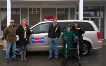 Jane Good shows the van to some of the van fund contributors. From left are Tony Curulla, Boothbay Harbor Rotary; Jane Good; Bruce White; Trudy and Patty Seybold. Courtesy of the Community Center