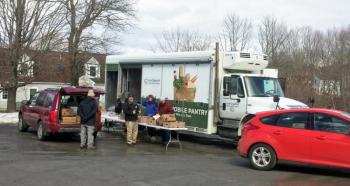 The Good Shepherd Food Mobile sets up in the parking lot across from the Congregational Church of Boothbay Harbor when it comes to town. SUZI THAYER/Boothbay Register