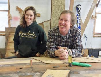 Sarah and David Nutt at his boat building shop on River Road in Edgecomb. SUZI THAYER/Boothbay Register