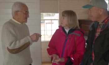 Historian Bill McKeen talks with visitors during Tartan Day. ART MAYERS/Boothbay Register