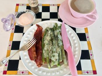 Creamed asparagus on toast, with bacon on the side, and a cup of cappuccino, is a ridiculous breakfast. SUZI THAYER/Boothbay Register