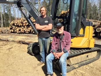 Eric and his dad, Al, at the pellet-making wood plant in Boothbay. SUZI THAYER/Boothbay Register