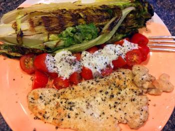 Sautéed romaine lettuce with pan-fried chicken breast, and some grape tomatoes with lemon greek yogurt. SUZI THAYER/Boothbay Register
