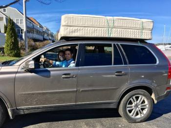 Cindy Blanton and Taylor Dunn take a mattress home from Brown’s Wharf on May 4. SUZI THAYER/Boothbay Register