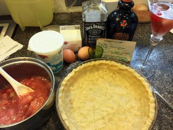Rhubarb custard pie in the making. Everything is more fun with a manhattan. SUZI THAYER/Boothbay Register