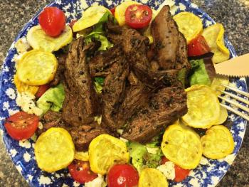 Roasted summer squash with a hot steak salad. SUZI THAYER/Boothbay Register