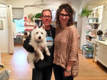 Jay, Kasey and Charlie (the Westie) McNamara, at their Wiscasset boutique, In the Clover. SUZI THAYER/Boothbay Register