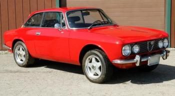 This cute little 1975 Alfa Romeo speed sport coupe could be parked in your garage because it’s on the auction block the first weekend in June! Courtesy of Thomaston Place Galleries 1975 Alfa Romeo 5 speed sport coupe